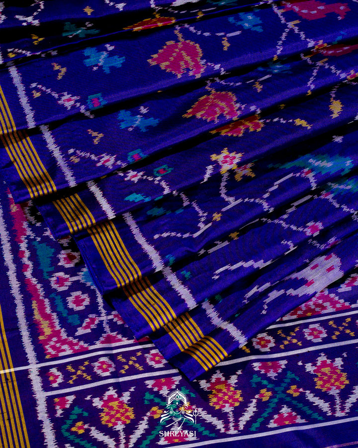 Handloom Pure Rajkot Single Ikat Patola Silk Saree with Hand-Embroidered Raw Silk Blouse