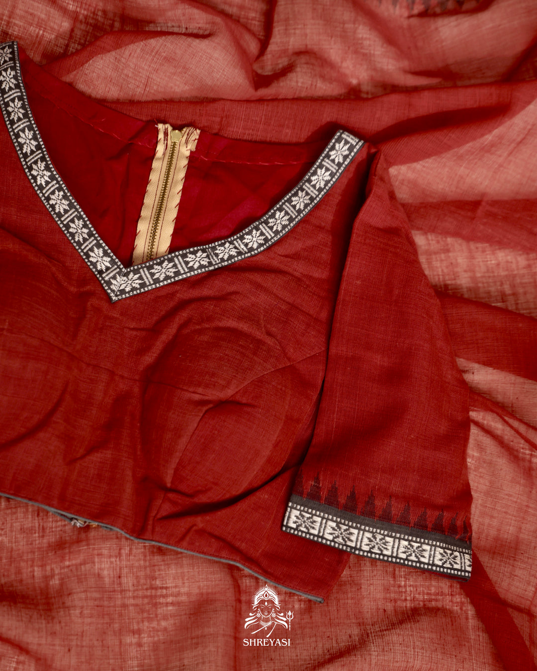 Handloom Bawan Buta cotton saree with contrast borders and a soft breathable drape