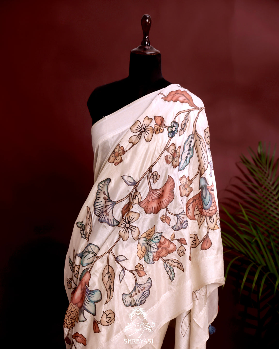 Kota saree with floral kalamkari appliqué work, contrast border, and lightweight breathable drape