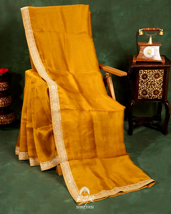 Pure Organza Silk Saree with Embellished Borders and Patola Print Silk Blouse