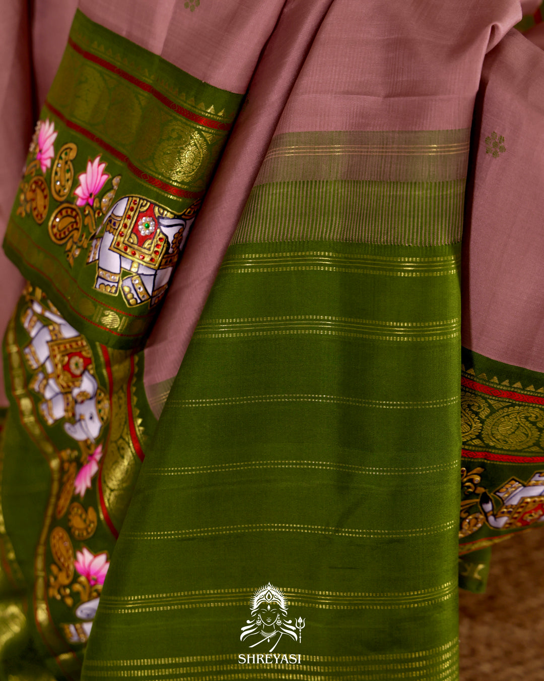 Handloom Pure Kanjivaram Silk Saree in Real Zari with Tanjore Yanai and Kamalam Artwork