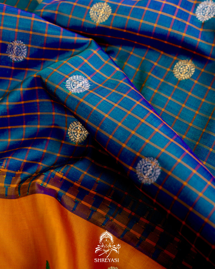 Handloom Pure Gadwal Silk Saree
in Kuttu Weaving and Rich Zari Pallu