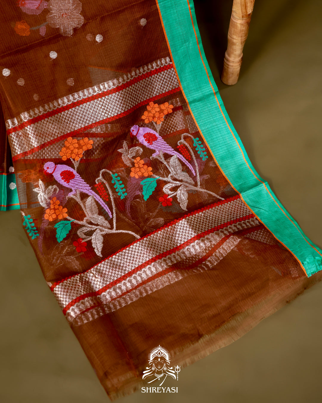 Zari Kota Silk Saree with Bird Motifs and Contrast Turquoise Blouse