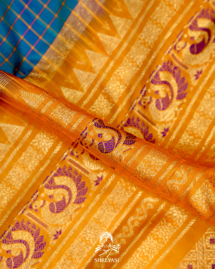 Handloom Pure Gadwal Silk Saree
in Kuttu Weaving and Rich Zari Pallu