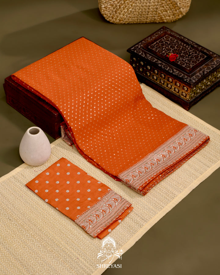 Georgette Saree with Embroidered Borders and Satin Embroidered Blouse