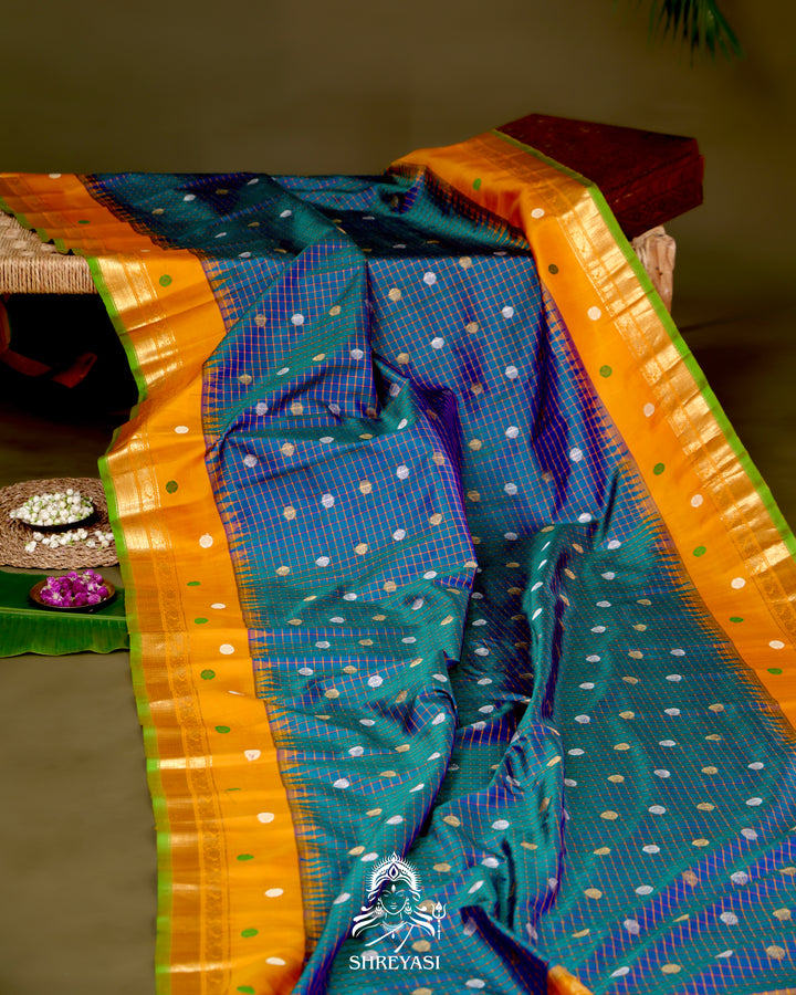 Handloom Pure Gadwal Silk Saree
in Kuttu Weaving and Rich Zari Pallu