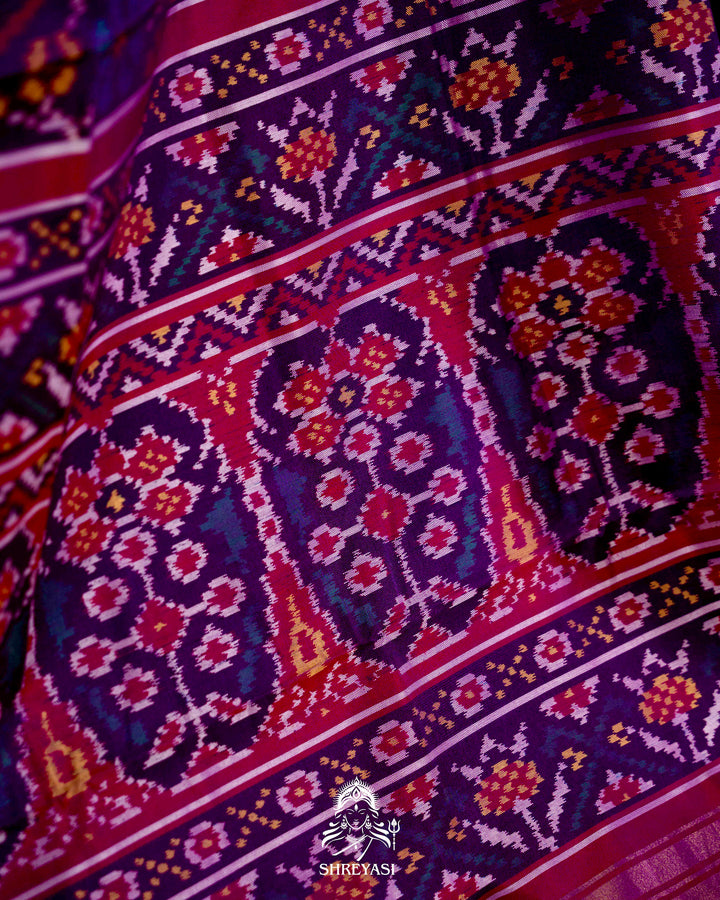 Handloom Pure Rajkot Patola Silk Saree with Animal & Floral Ikat Motifs