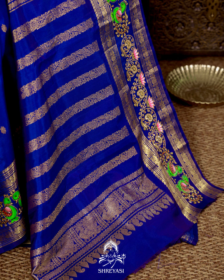 Handloom Pure Kanjivaram Silk Saree in Real Zari with Tanjore Mayil and Kamalam Artwork