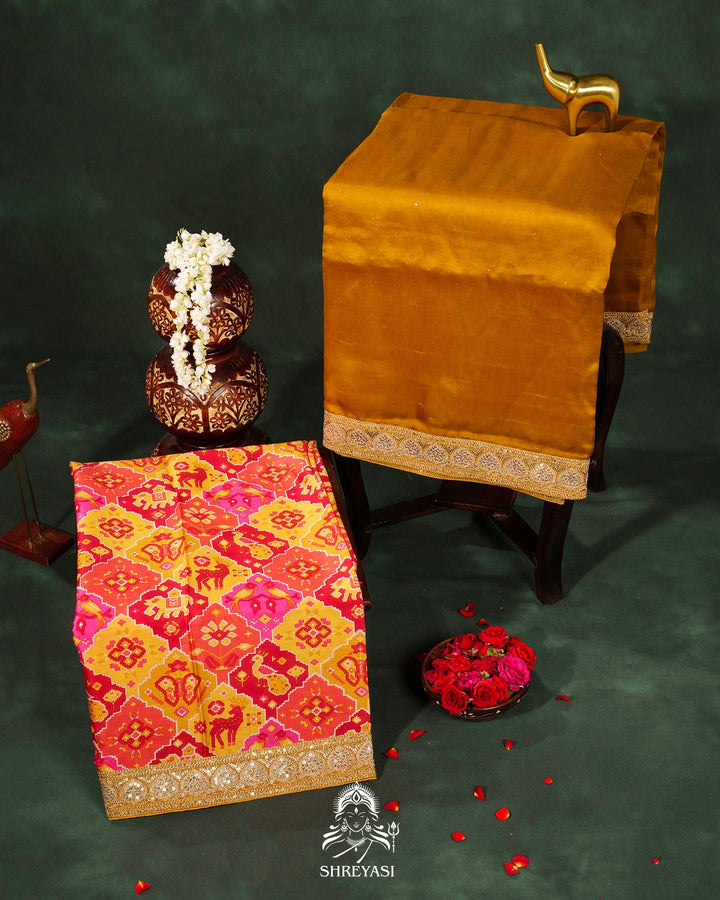 Pure Organza Silk Saree with Embellished Borders and Patola Print Silk Blouse