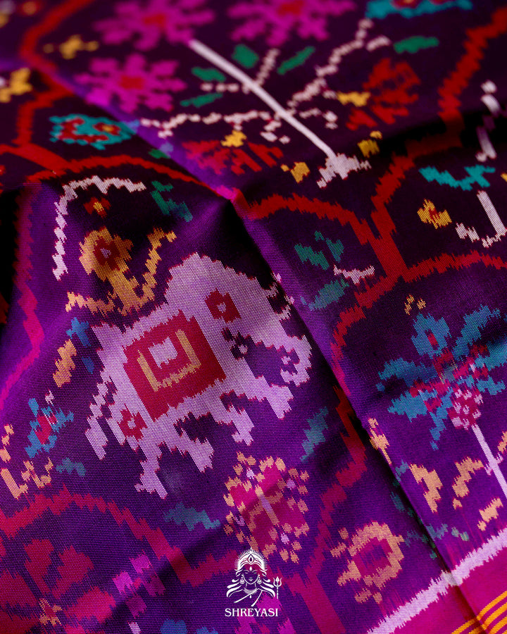 Handloom Pure Rajkot Patola Silk Saree with Animal & Floral Ikat Motifs