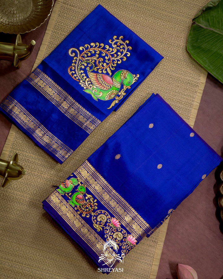 Handloom Pure Kanjivaram Silk Saree in Real Zari with Tanjore Mayil and Kamalam Artwork