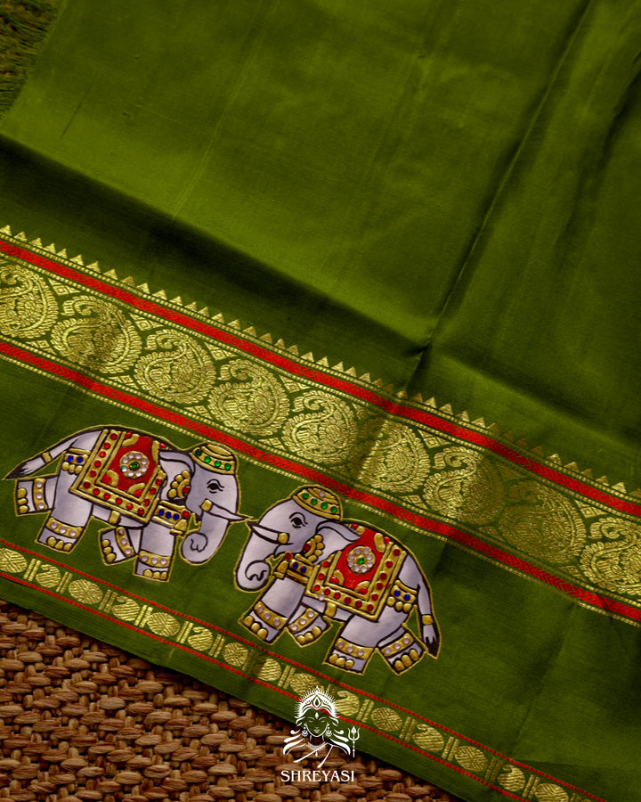 Handloom Pure Kanjivaram Silk Saree in Real Zari with Tanjore Yanai and Kamalam Artwork