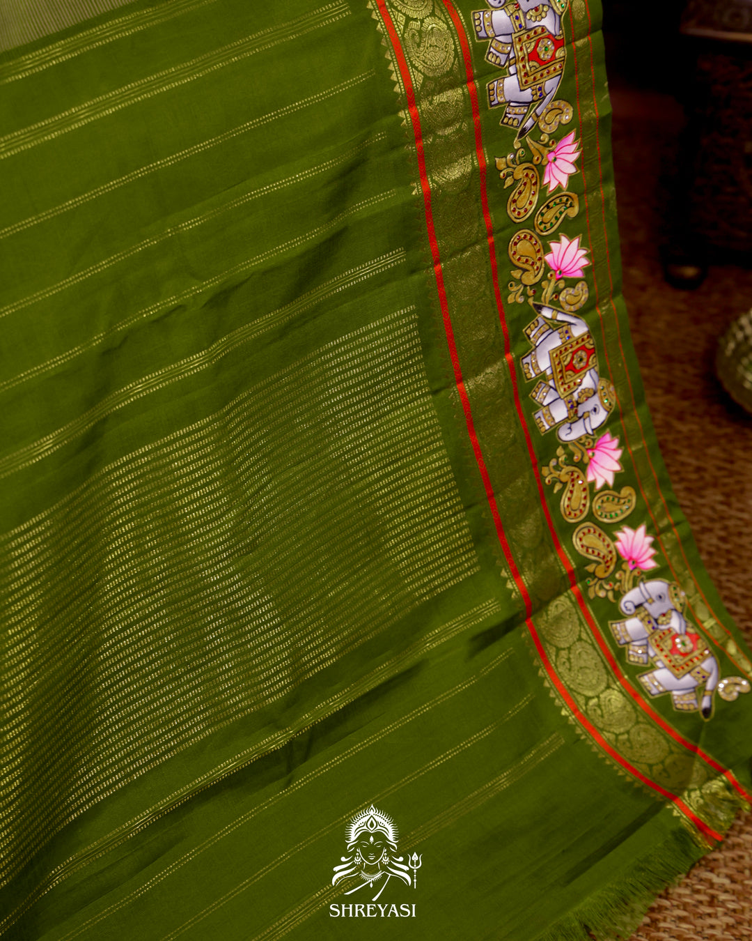 Handloom Pure Kanjivaram Silk Saree in Real Zari with Tanjore Yanai and Kamalam Artwork