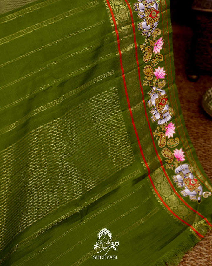 Handloom Pure Kanjivaram Silk Saree in Real Zari with Tanjore Yanai and Kamalam Artwork