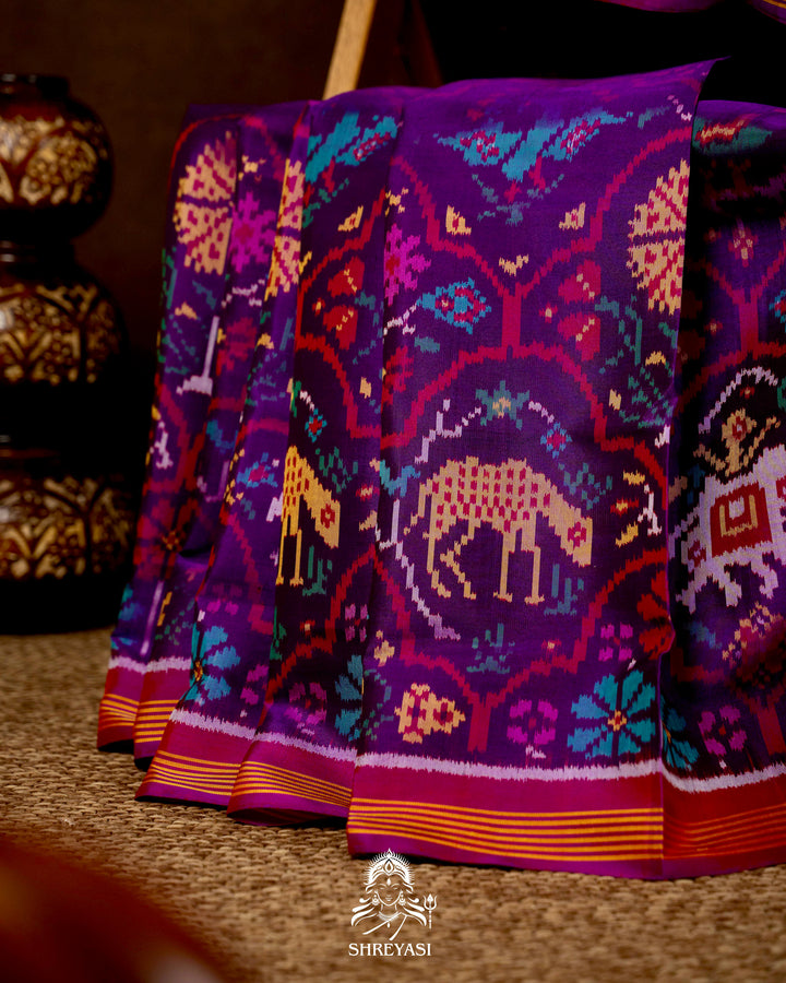 Handloom Pure Rajkot Patola Silk Saree with Animal & Floral Ikat Motifs