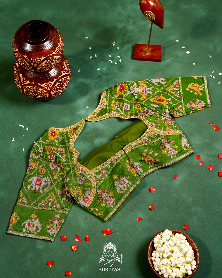 Handloom Pure Single Ikat Rajkot Patola Silk Blouse with Rich Hand Embroidery