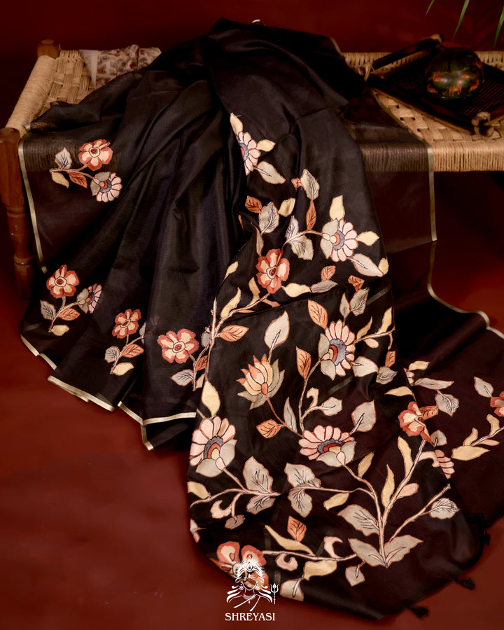 Kota saree with floral kalamkari appliqué work, contrast border, and lightweight breathable drape
