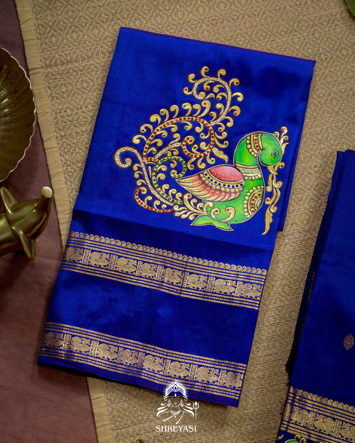 Handloom Pure Kanjivaram Silk Saree in Real Zari with Tanjore Mayil and Kamalam Artwork