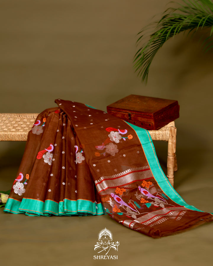 Zari Kota Silk Saree with Bird Motifs and Contrast Turquoise Blouse