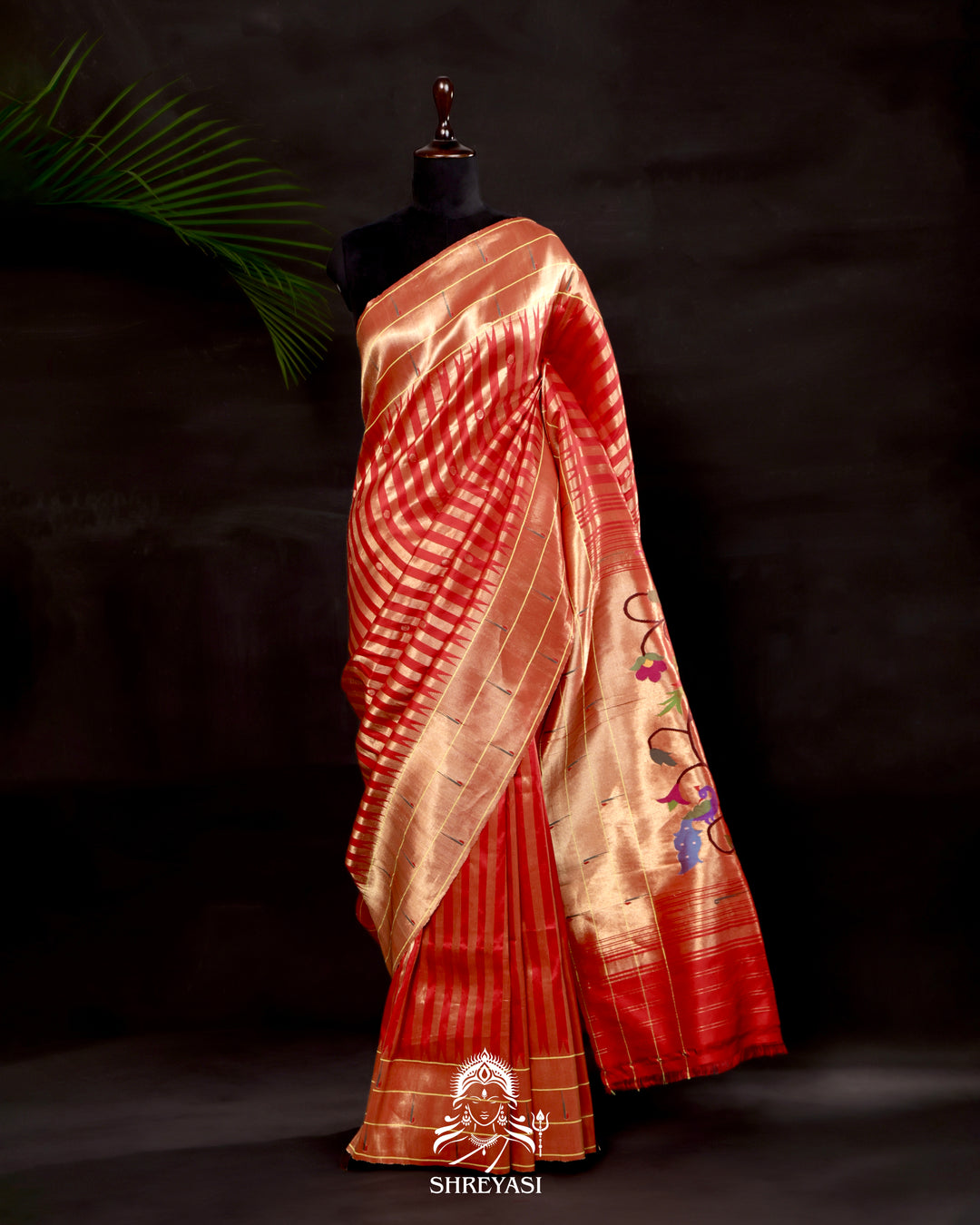 Handloom pure Paithani silk saree with woven zari stripes, delicate bhutis, and traditional Paithani motif designer pallu in vibrant hues